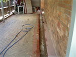 Pavers lifted up and sprayed (Click to enlarge)
